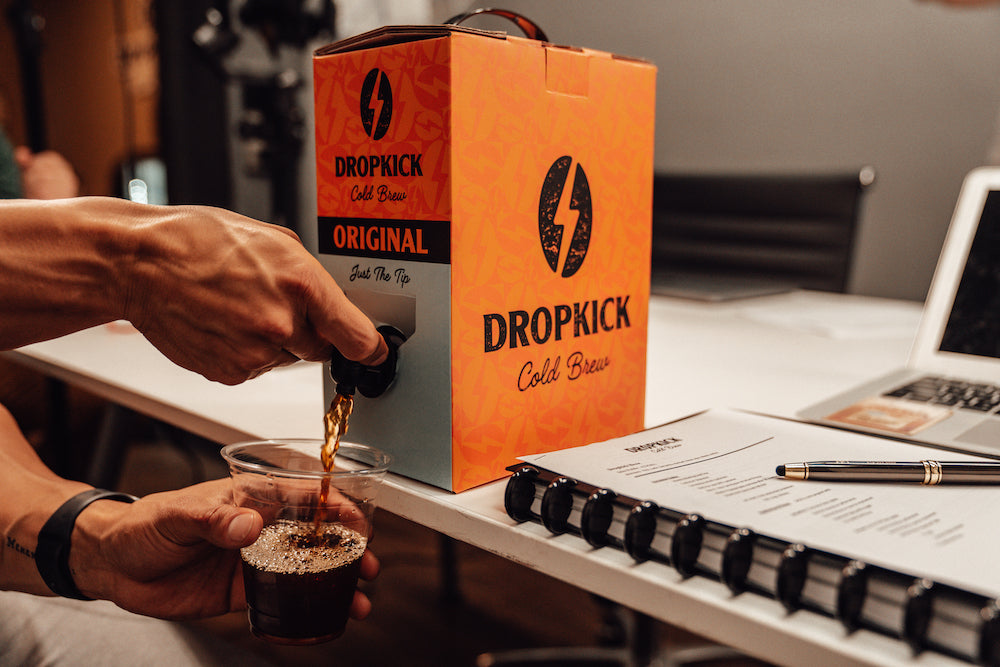 DropKick Cold Brew BrewBox coffee being poured into a cup